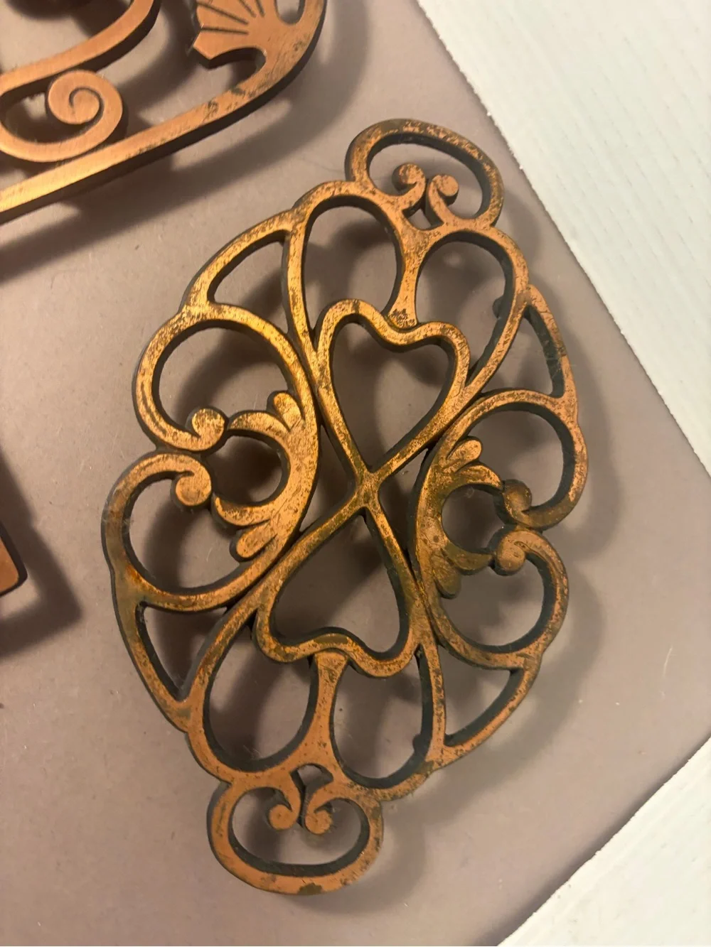 Pampered Chef Copper-Tone Decorative Cast Iron Trivets Set